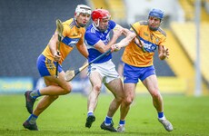 14-man Clare hold out to secure one-point victory over Laois as Kelly fires 0-13