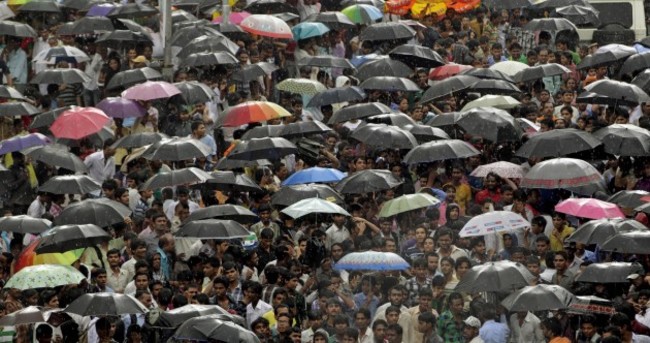 GALLERY: The world takes cover from heavy rain