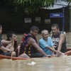 Residents flee as typhoon leaves three dead in north-eastern Philippines