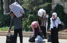 Thousands flee Syria as war rages on