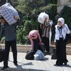 Thousands flee Syria as war rages on