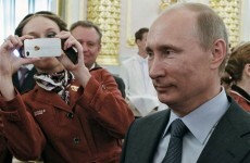 Putin signs law forcing some Russian NGOs to register as 'foreign agents'