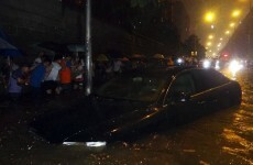 Ten die in record rains in Beijing