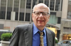 Murdoch resigns from boards of UK newspapers