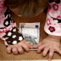 Government undecided on child benefit tax for wealthy