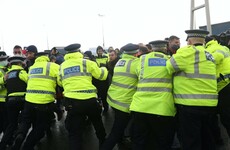 Man arrested as stranded lorry drivers clash with police in England