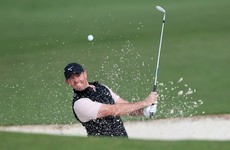 McIlroy fails to build on brilliant start as play is suspended in Abu Dhabi