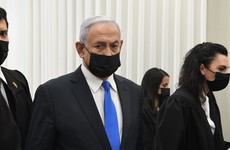 Israel's Netanyahu denies corruption charges as trial resumes