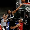 Giannis Antetokounmpo lifts Bucks over dogged Pelicans