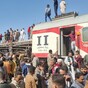 Two trains collide in southern Egypt, killing at least 32 and injuring dozens