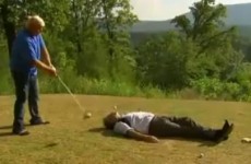 VIDEO: John Daly hits a drive with David Feherty acting as a human tee