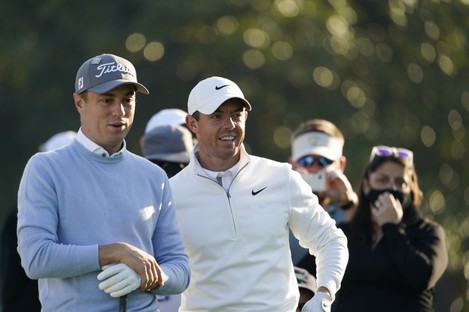 Justin Thomas and Rory McIlroy during a practice round for The Masters.