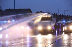 Police blast rioters with water cannon as violence flares again in Northern Ireland