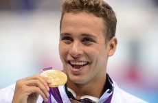 Sweet dreams: Le Clos slept with gold medal after beating Games legend Phelps