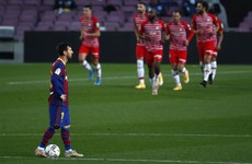 Barcelona's shock defeat keeps La Liga title race wide open