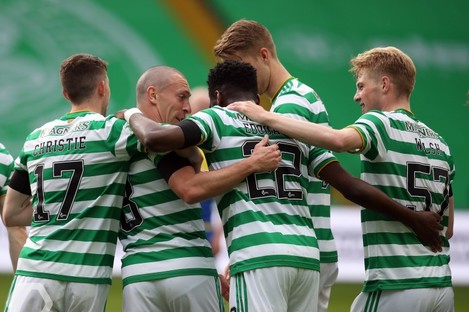 Celtic players celebrate scoring against St Johnstone.