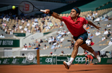 Federer impresses with straight-sets win on grand slam return at French Open