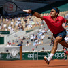 Federer impresses with straight-sets win on grand slam return at French Open