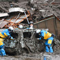 Two people dead and 20 missing after mudslide rips through Japan town