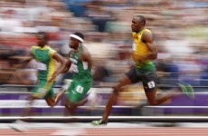 Bolt and Blake ease through 200m rounds