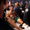 Leg injury to Conor McGregor ends trilogy bout against Dustin Poirier