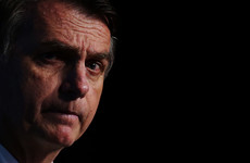 Brazil's Bolsonaro in hospital following persistent hiccups, may need surgery to remove obstruction