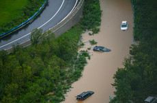 At least 25 die in floods after a year's rain fell on China province in three days