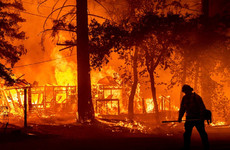 Winds stoke California’s largest fire as blazes scorch US West