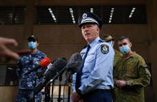 Troops hit Sydney streets to help enforce its prolonged lockdown