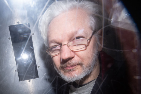 Julian Assange leaving court.