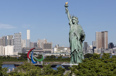 Paralympic flame arrives in Tokyo as virus surges days before opening