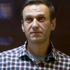 Merkel 'demands' Putin free Kremlin critic Navalny as pair meet in Moscow