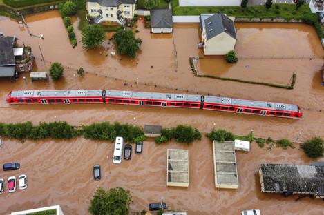 A regional train in the flood waters at the local station in Kordel, Germany.
