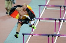 The discus champion who unleashed a wild celebration had to sleep on the ground outside