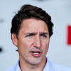 Justin Trudeau hit by small stones thrown by protesters