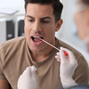 Less invasive saliva PCR test 'almost as accurate' as nose/throat swab