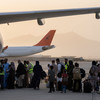 First foreigners on commercial flight fly out of Kabul since US pulled out