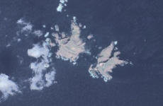 Japan may ask international court to rule on disputed islands