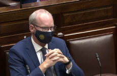 Minister Simon Coveney wins confidence vote in the Dáil by 92 votes to 59