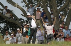 PGA Championship: McIlroy's charge cut short by storms