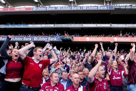 Galway fans celebrate late in the game yesterday.