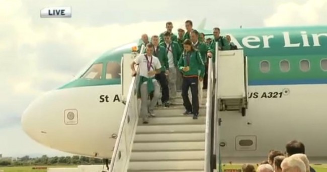 They're home! Katie Taylor and fellow Olympians touch down