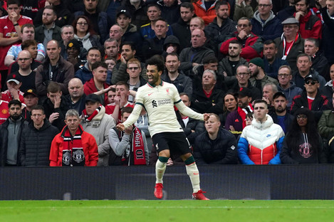 Liverpool's Mohamed Salah celebrates scoring their side's third goal 
