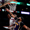 The Los Angeles Lakers hold on to beat the Miami Heat in overtime