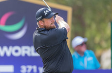 Lowry shares lead in Dubai while McIlroy slips shot off the pace
