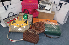 Cash and designer bags seized after 24 raids in Dublin and Meath