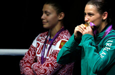 'After they raised her hand, I asked Katie and her coaches how much her medal was worth'