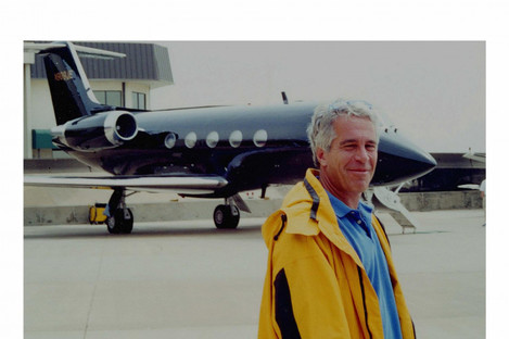 Undated handout photo issued by US Department of Justice of Jeffrey Epstein standing in front of his second private plane, which has been shown to the court during the sex trafficking trial of Ghislaine Maxwell. 
