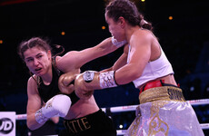 Taylor holds off bruising challenge of Sharipova to defend lightweight title