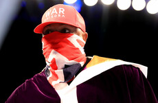 Derek Chisora tapes mouth and opts to play music in bizarre press conference